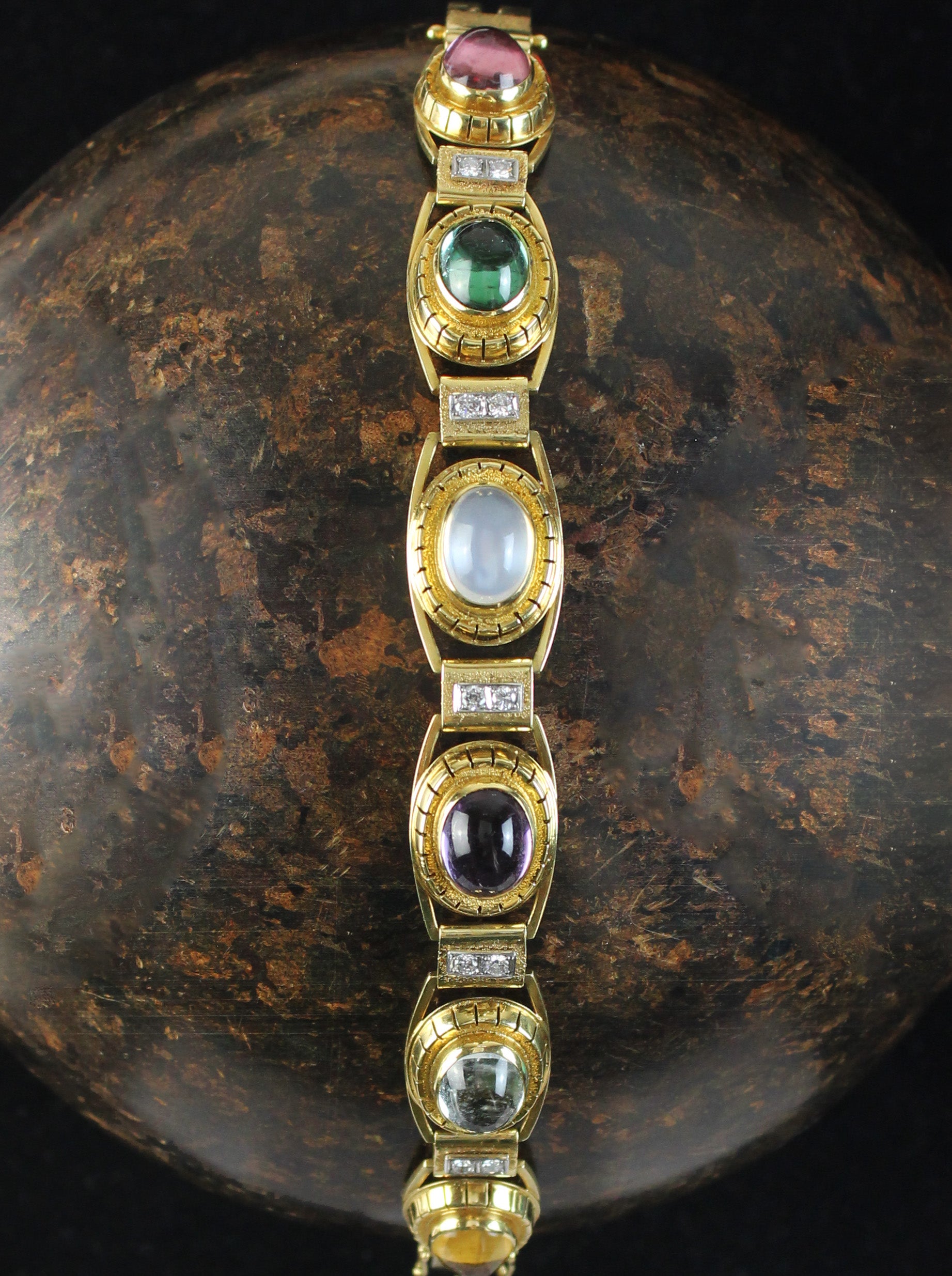 Colorful gold bracelet with diamonds & gemstones