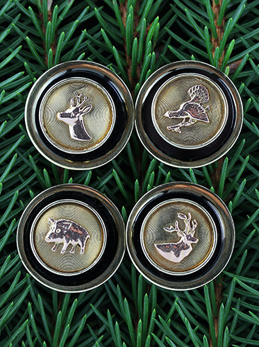An exceptionally rare pair of hunting cufflinks