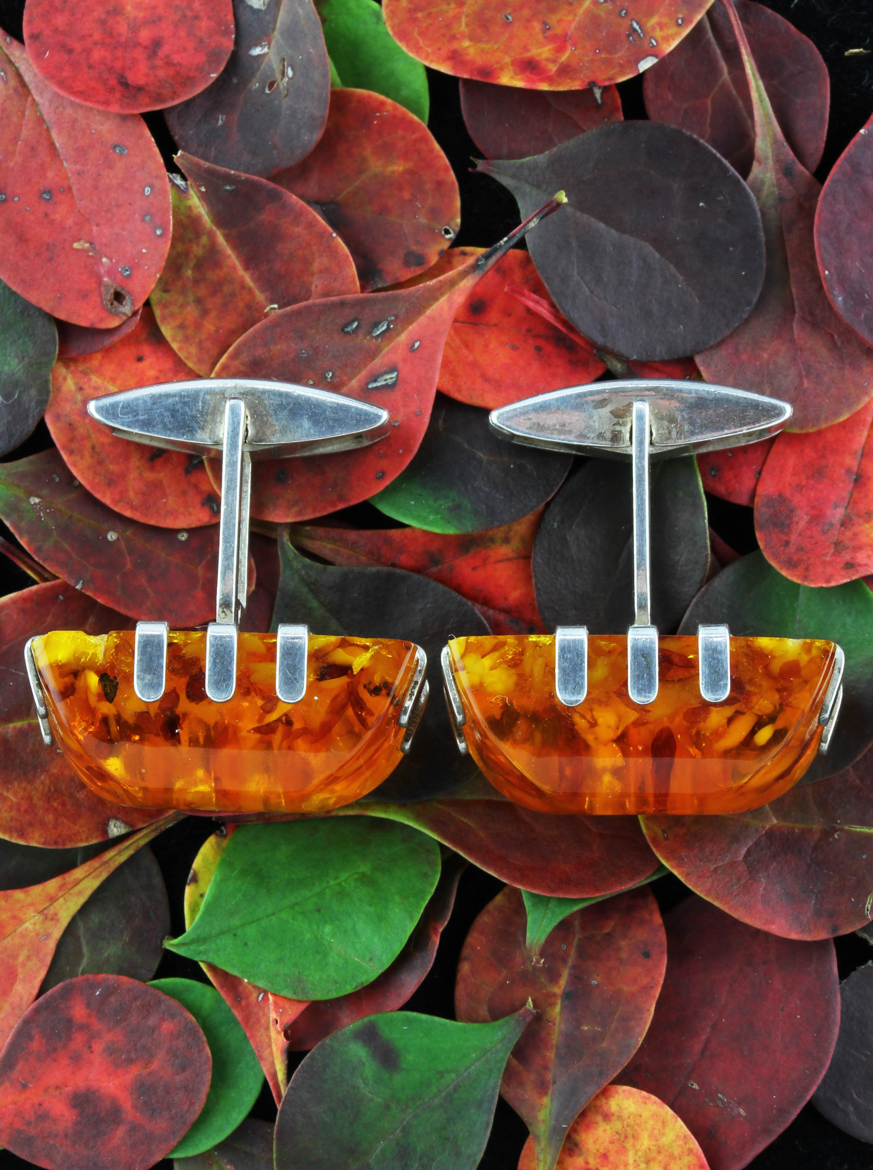 Silver amber cufflinks made by Fischland