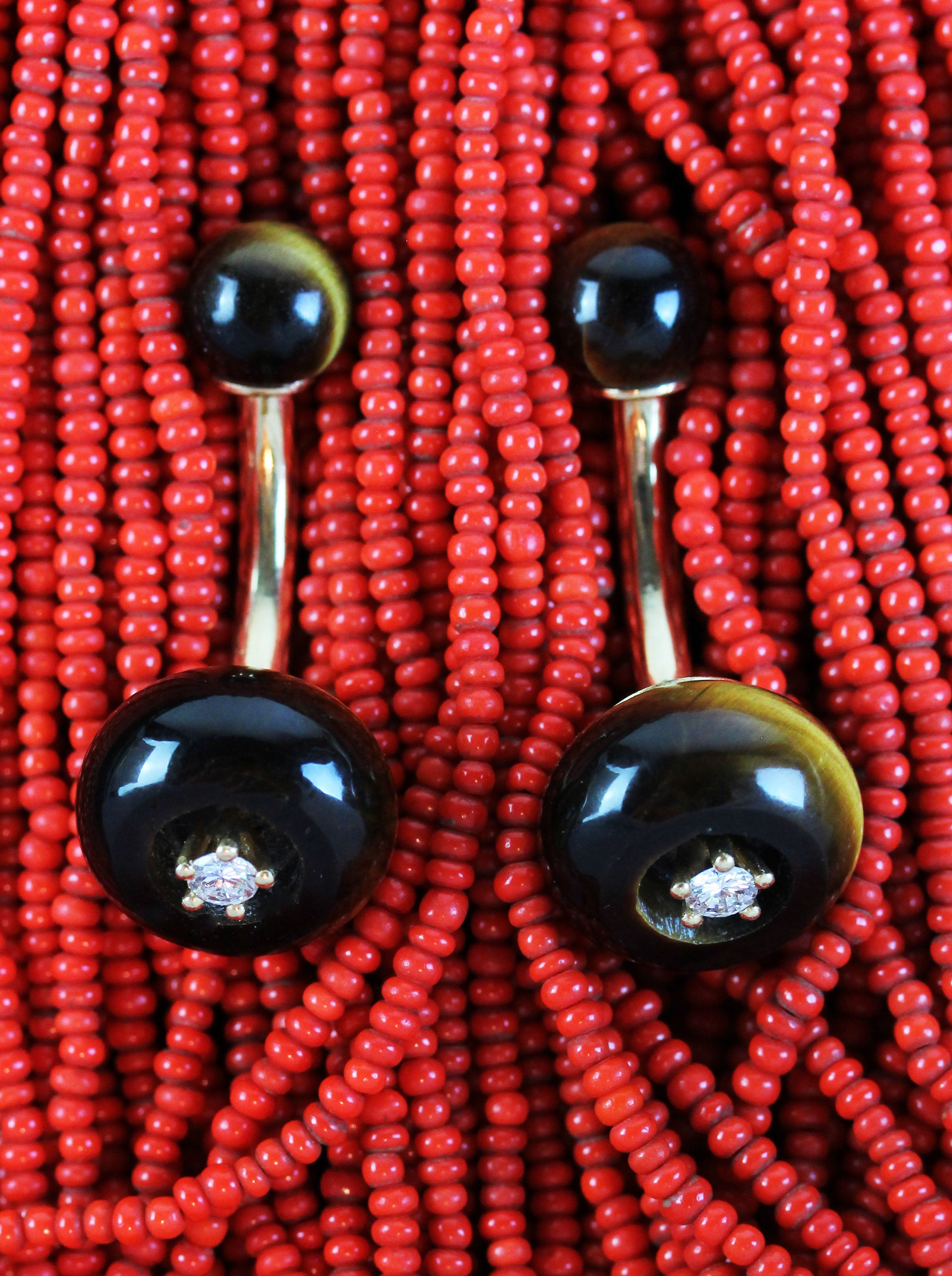 Tigereye cufflinks in gold with diamonds