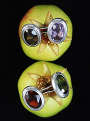 Pair of colorful cufflinks with gemstones