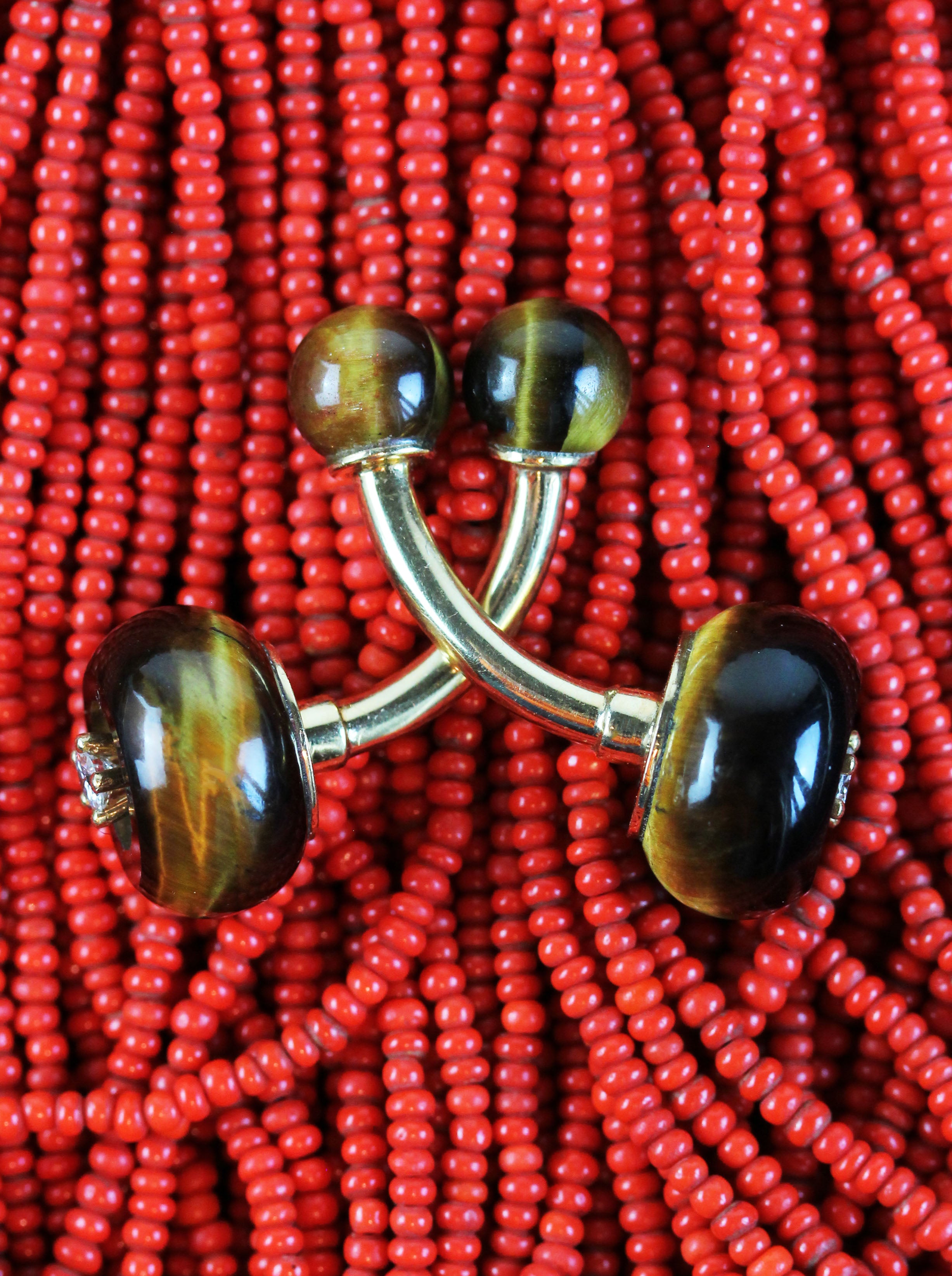 Tigereye cufflinks in gold with diamonds