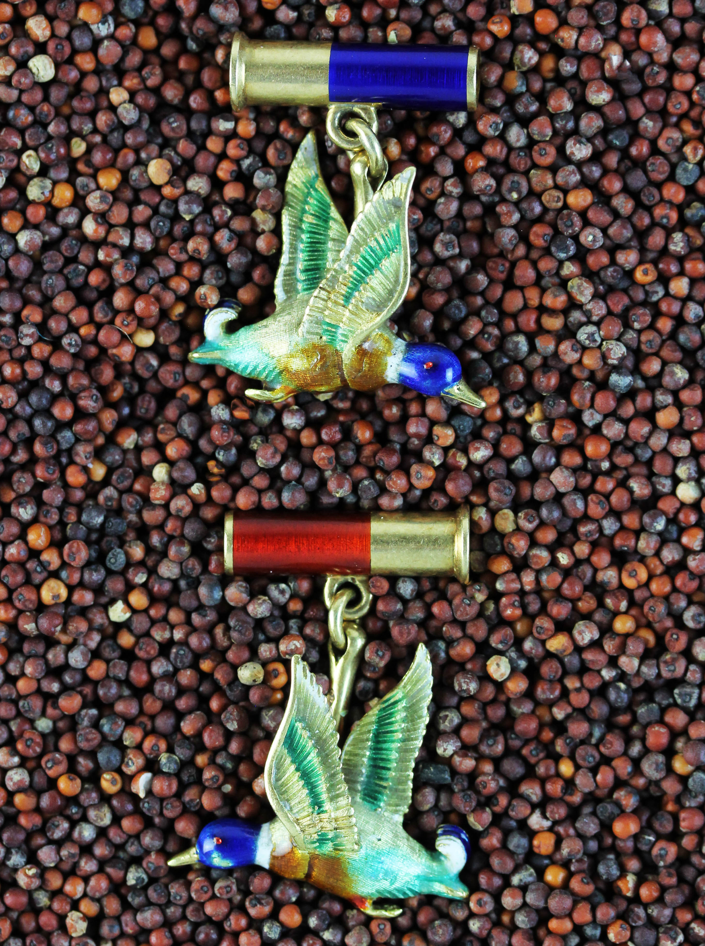 Golden dug hunting cufflinks with colorful enamel