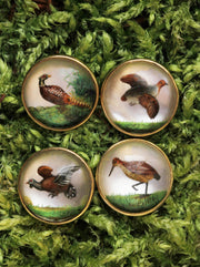 Golden bird hunting cufflinks in intaglio technique