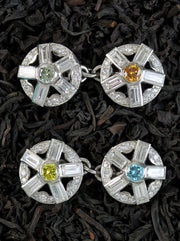 Diamond cufflinks in white gold with color center diamonds