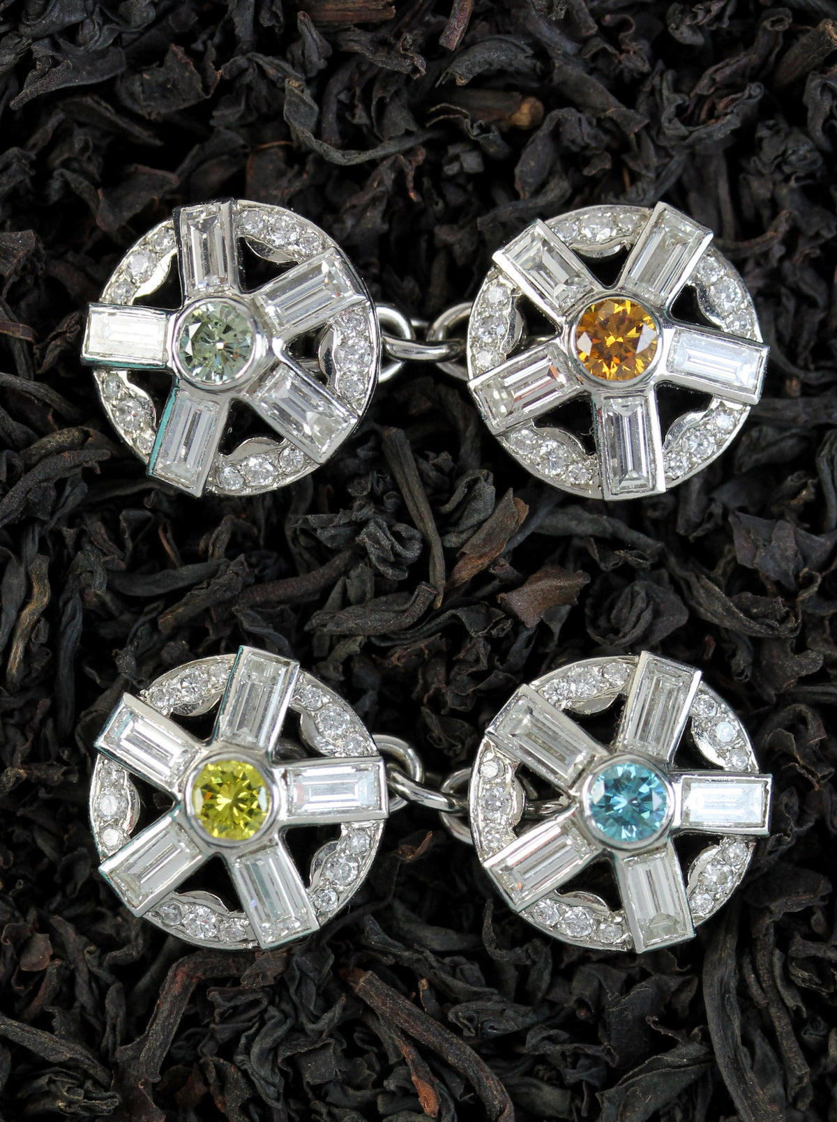 Diamond cufflinks in white gold with color center diamonds