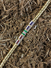 Fine  gold bracelet with rubies, emeralds, sapphires & diamonds