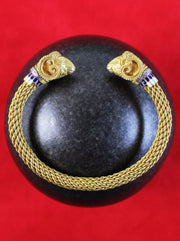 Gold bangle with aries, enamel & diamonds