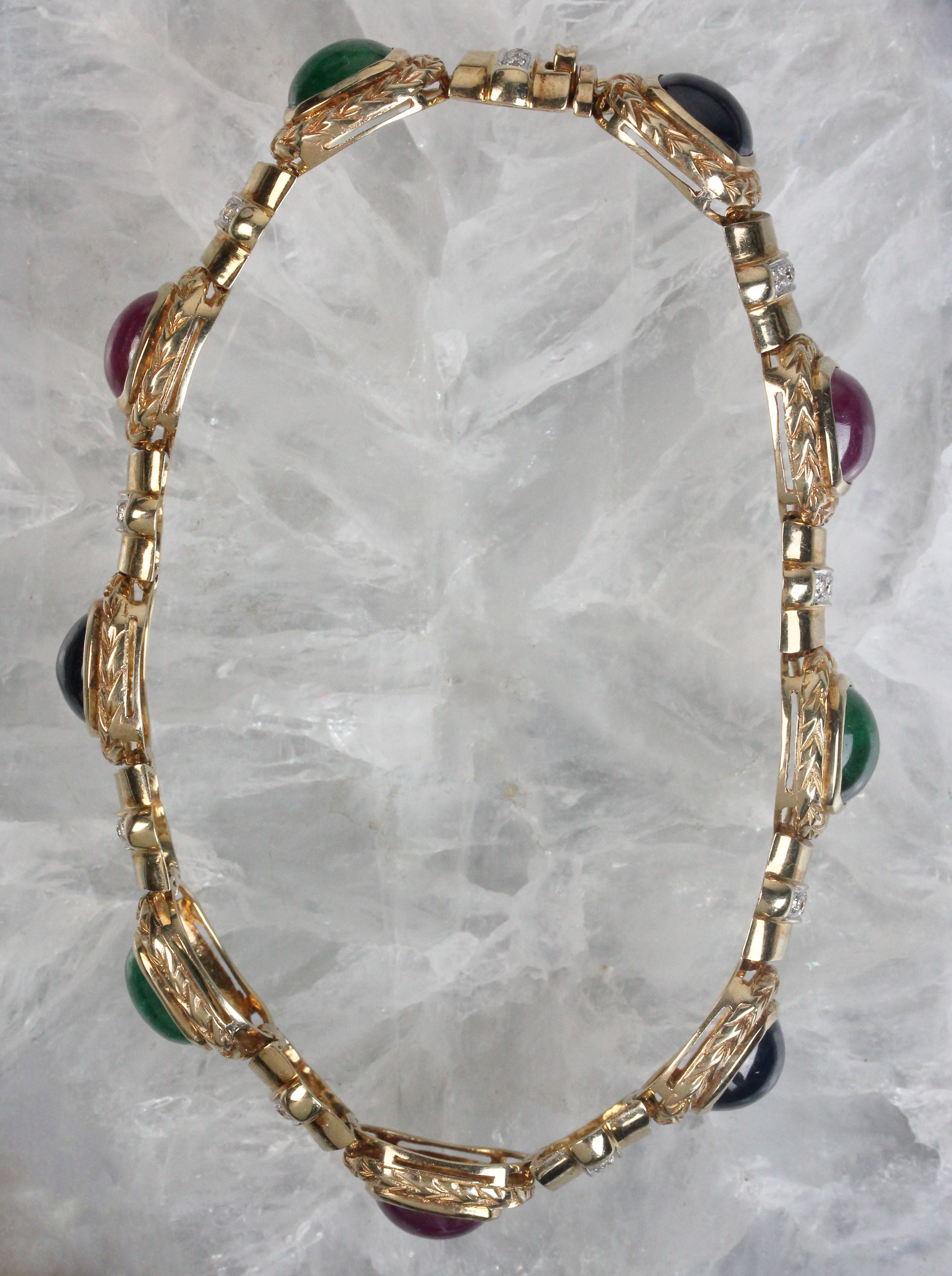 Colorful gold bracelet with rubies, sapphires, emeralds & diamonds