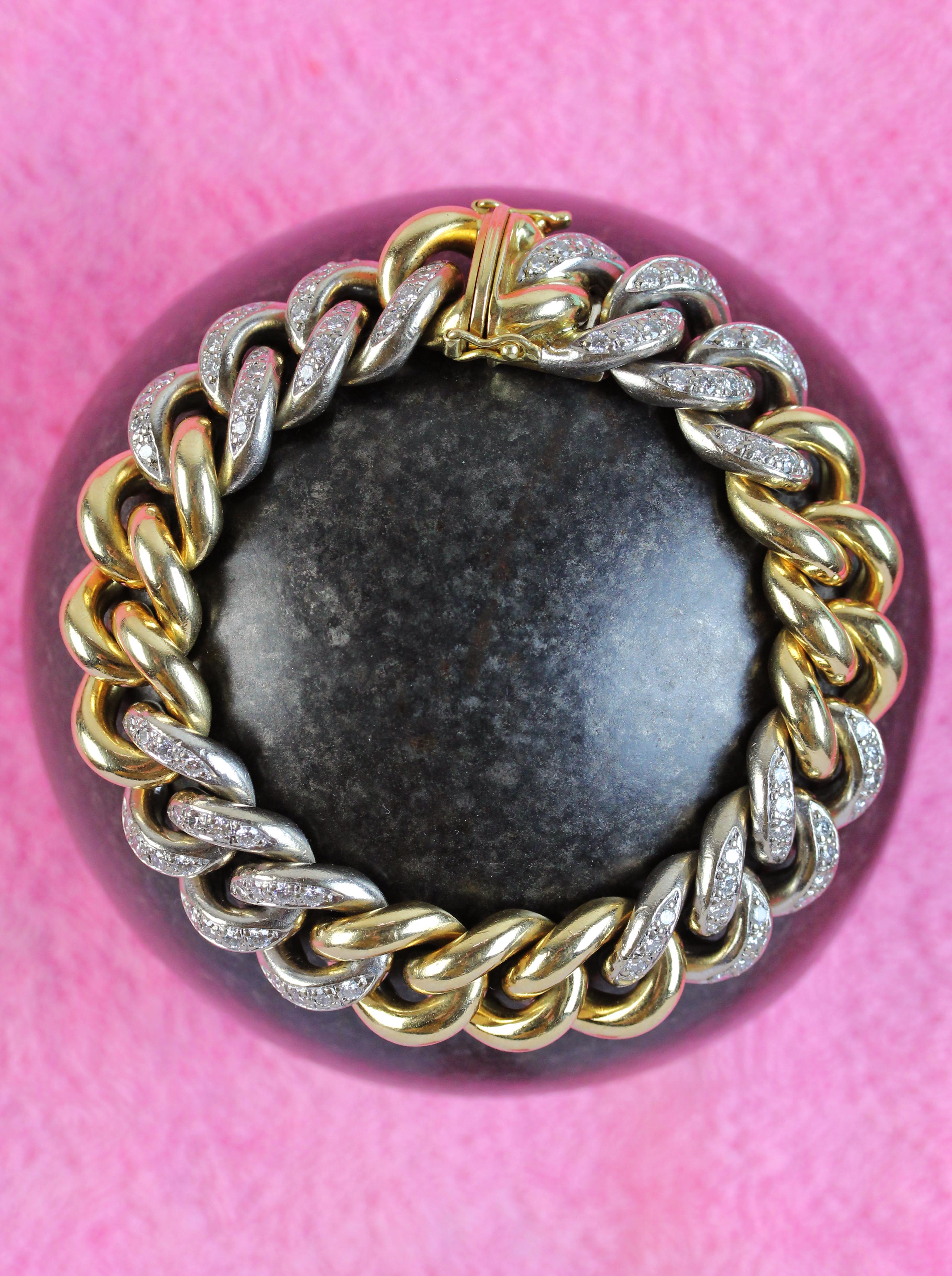 Solid made gold tank bracelet of about 136 grams with diamonds