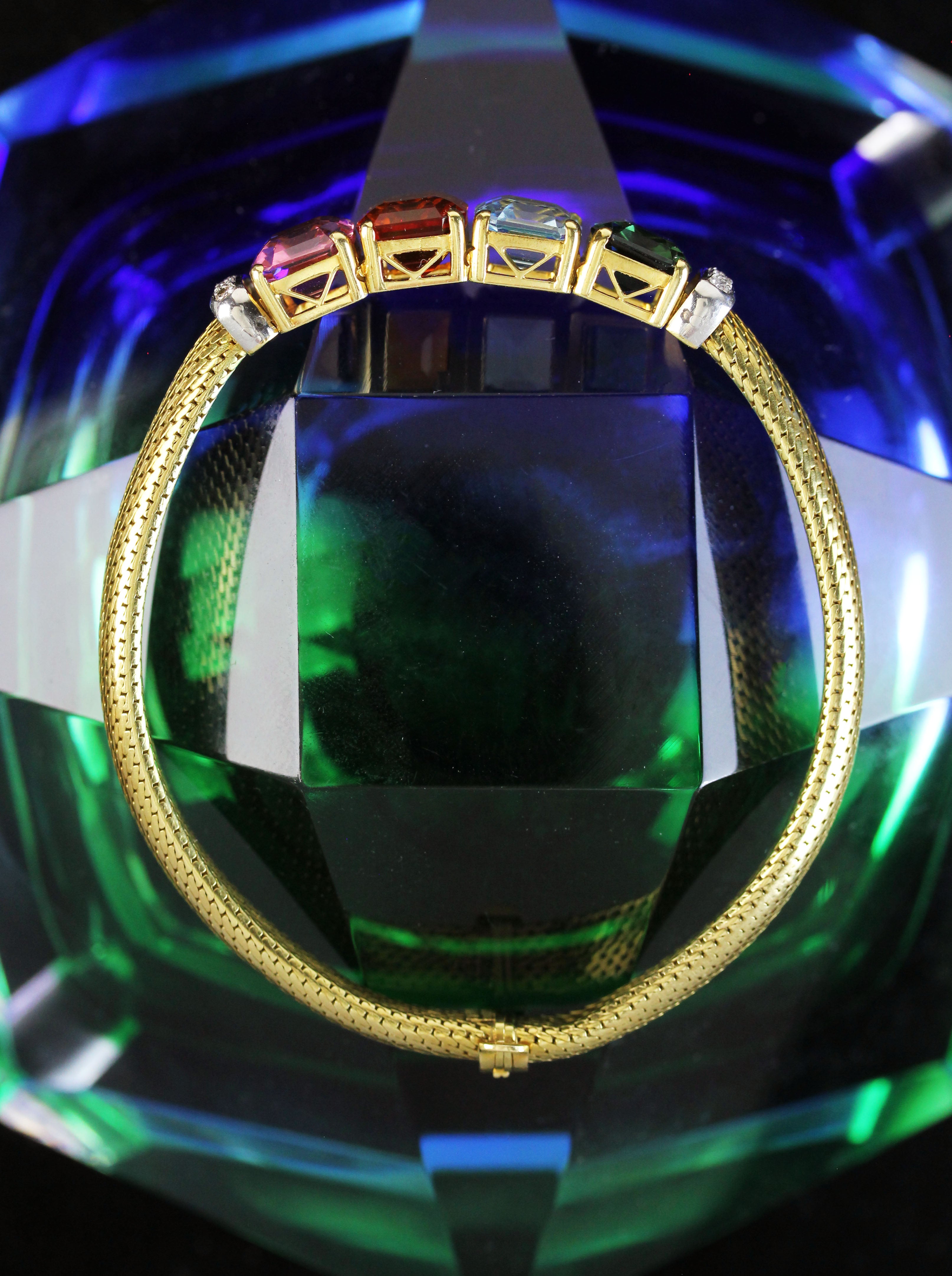 Colorful gold bracelet with high quality gemstones