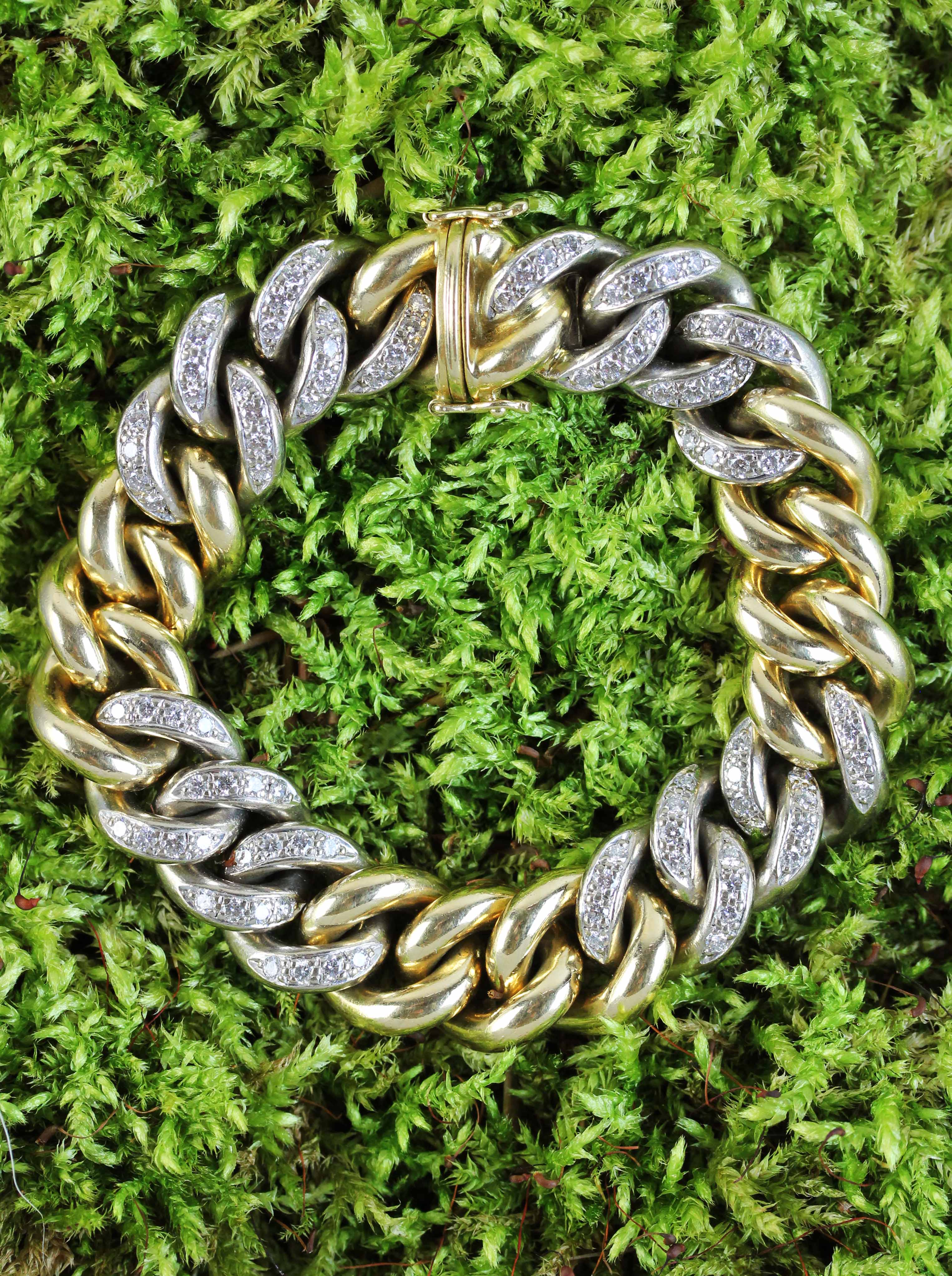 Solid made gold tank bracelet of about 136 grams with diamonds