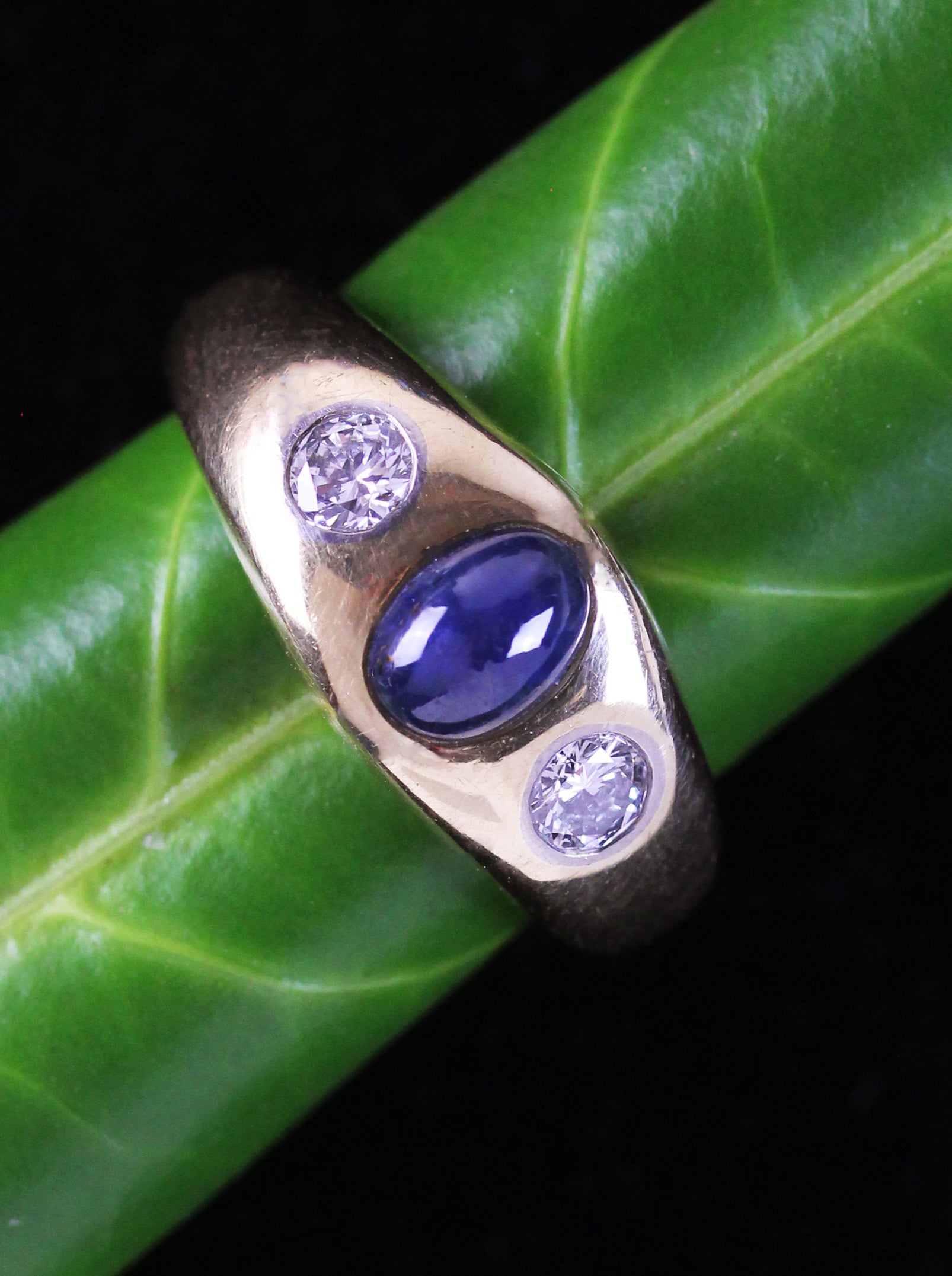 Very solid made gold band ring with sapphire & diamonds